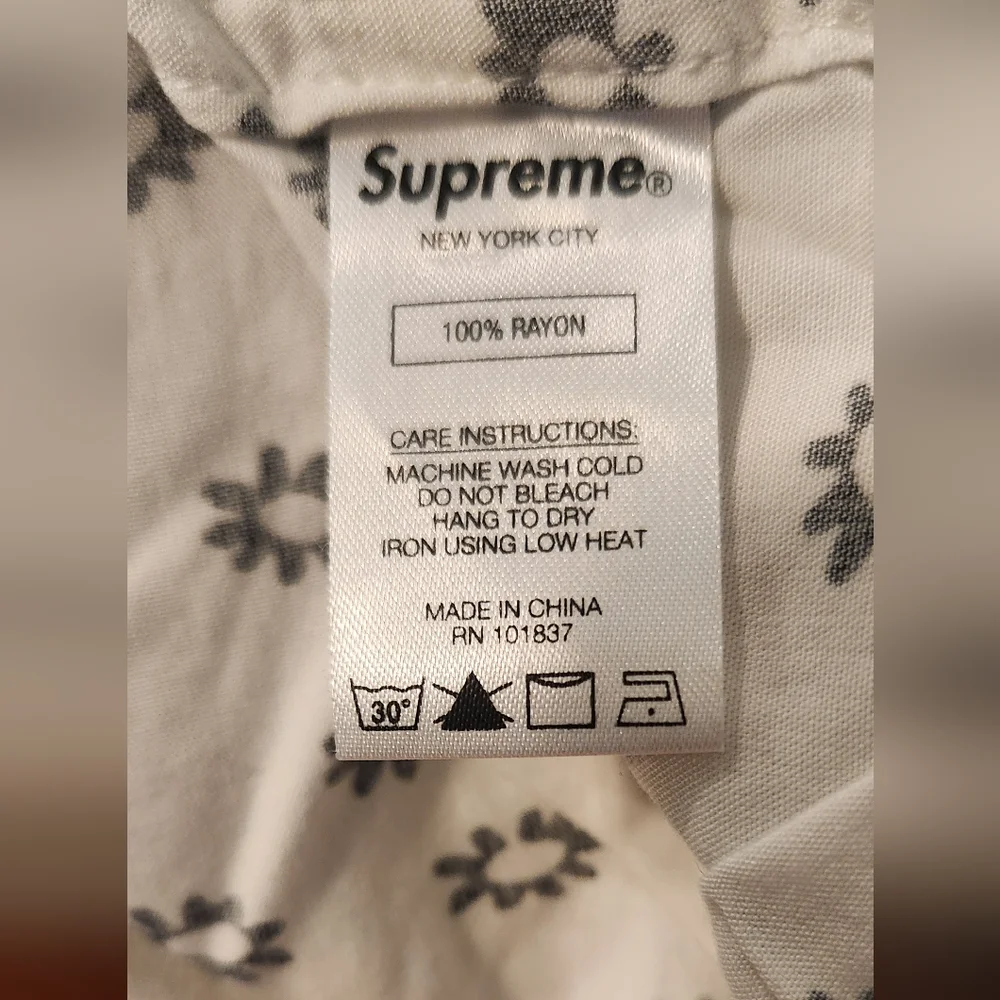 Supreme casual button